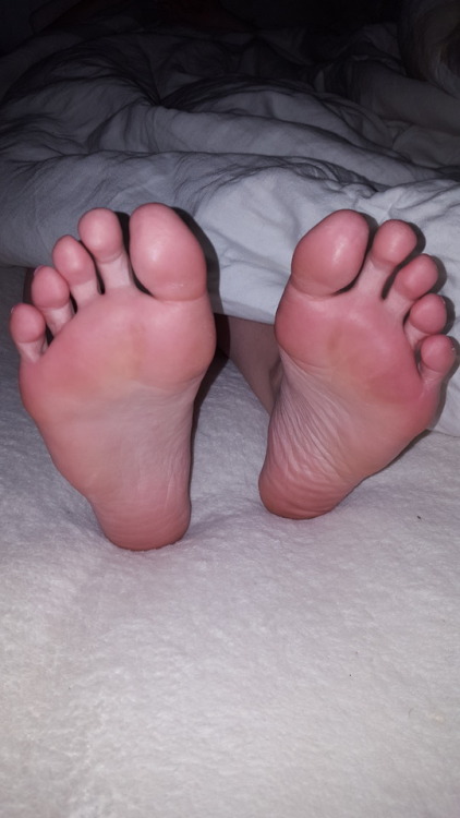 myprettywifesfeet:My pretty wifes soft sexy night soles laying in bed.please comment