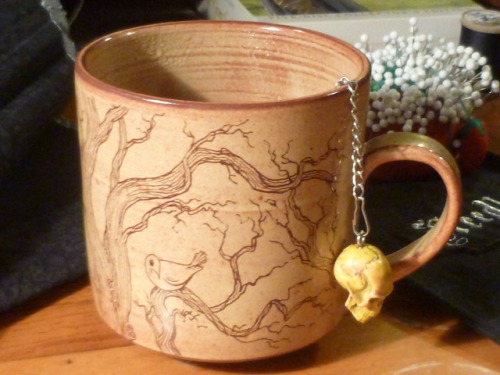 vincents-crows:I love my new mug!! It’s by Chase Benjamin Ceramics, with a decal that I drew. 