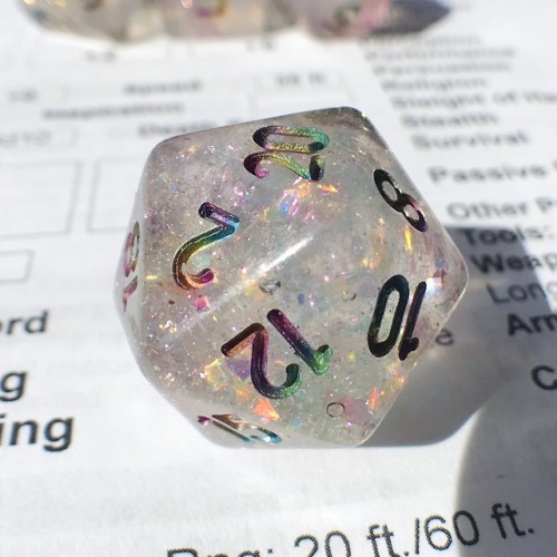 battlecrazed-axe-mage: Surpriiiiiise–I made ‘em rainbow!  These are Cozy Gamer’s Celestial dice with