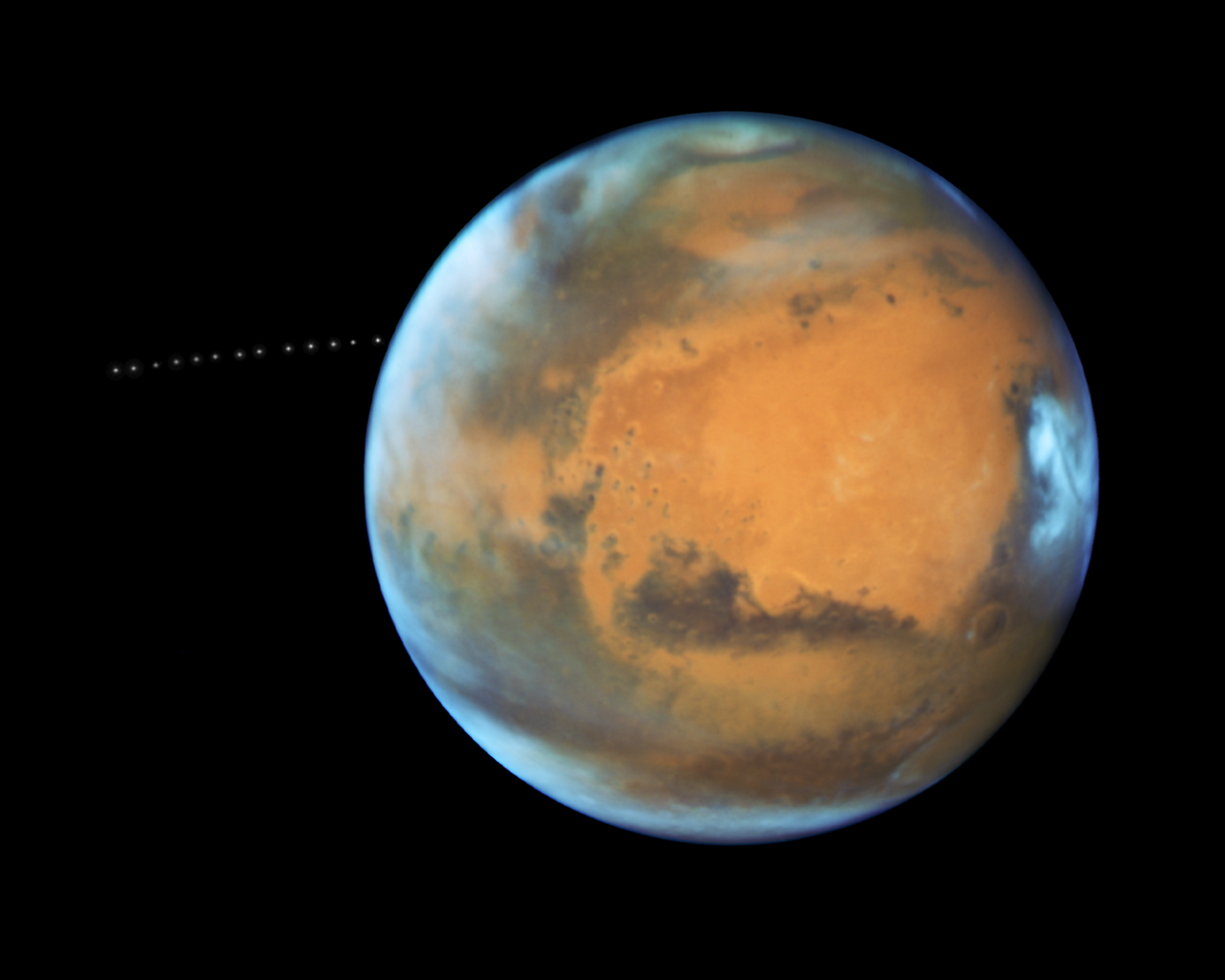 NASA’s Hubble Sees Martian Moon Orbiting the Red Planet [3000 x 2400] via /r/spaceporn http://ift.tt/2wIQfLz