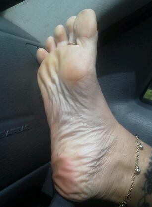 Wifes feet on dash