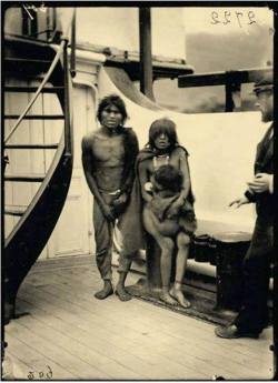 espacials:  black-american-queen:  black-american-queen:  euthanizeallwhitepeople:  jcoleknowsbest:  neoamericana:  nezua:  asustainablefuture:  A Selk’nam couple with their baby, on a ship en route to be exhibited in Europe as “wildmen”. The Selk’nam