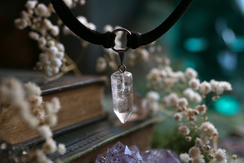 90377:This beautiful clear quartz necklace with polished point and faux black leather strings is now