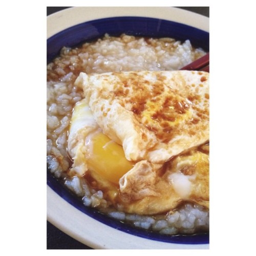 Congee, fried eggs, soy sauce. #childhood