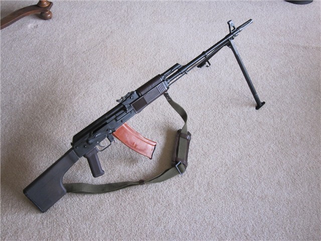 gunrunnerhell:  RPK-74 The fixed stock version chambered in 5.45x39mm. Not sure on