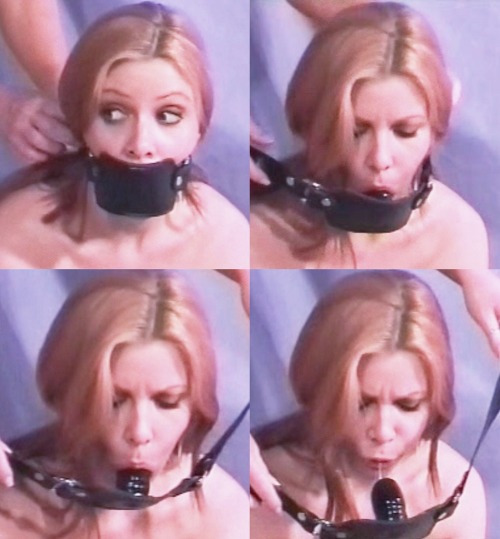 sensualhumiliation: Rubber penis gag in action !!