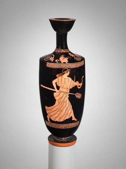 via-appia:Terracotta lekythos (oil flask), maenad with thyrsos & satyr eating grapesAttributed t