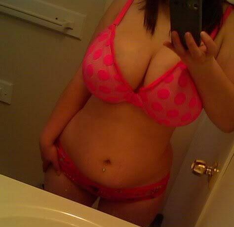 cleavagetweet: 34G cleavage curves in the mirror