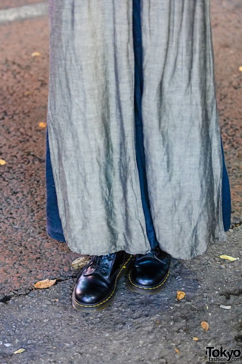 20-year-old Japanese student Kana on the street in Harajuku wearing a vintage linen maxi coat over a