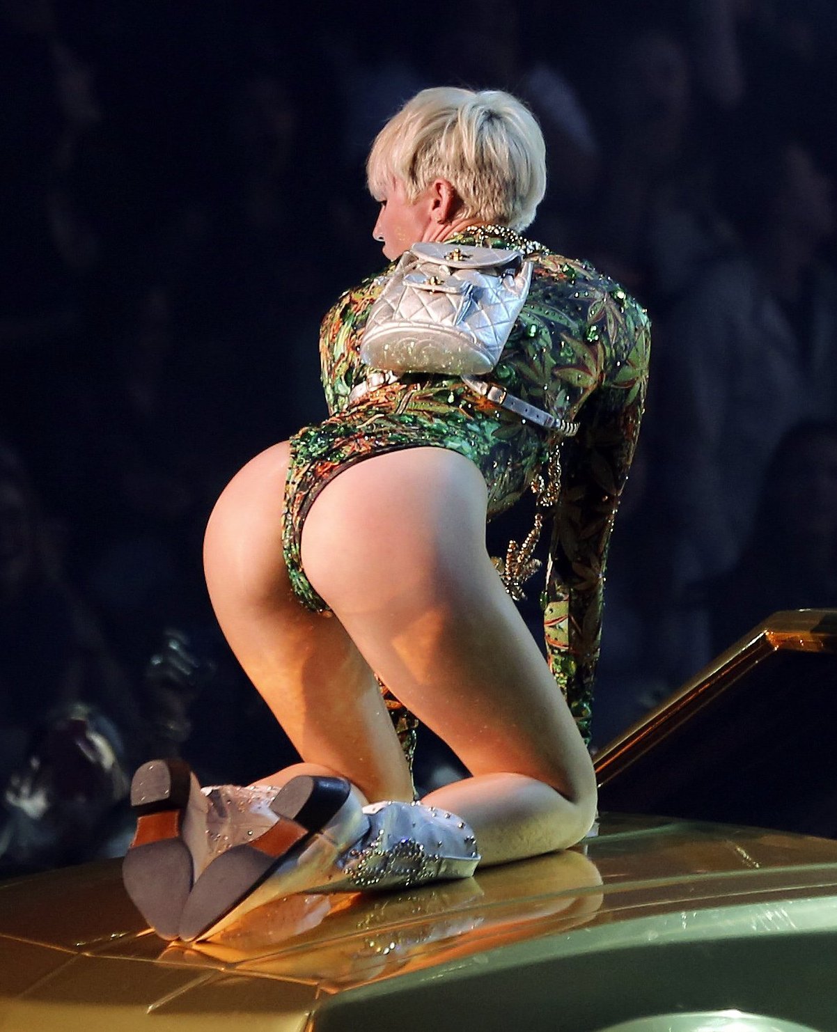 pornwhoresandcelebsluts:  More slutty twerking and ass posing in a thong from Miley
