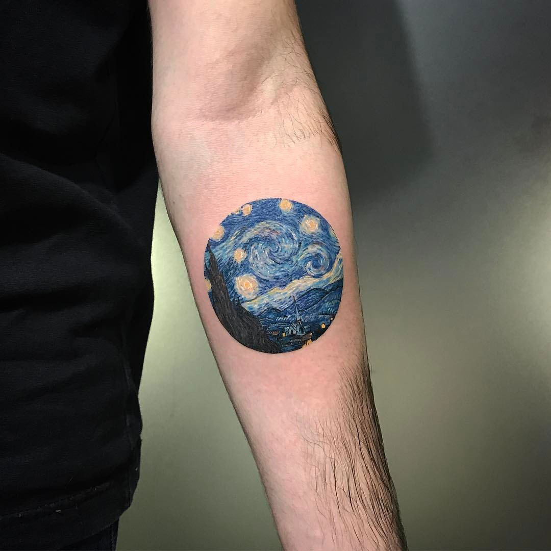 The Starry Night tattoo on the inner forearm