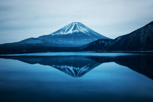 earth-land:  Mount Fuji - Japan   Rising 3776 meters above sea level, Mount Fuji is Japan’s tallest mountain and most iconic landmark. Images of the nearly perfect, solitary volcano have appeared in paintings, wood block prints and other artworks for