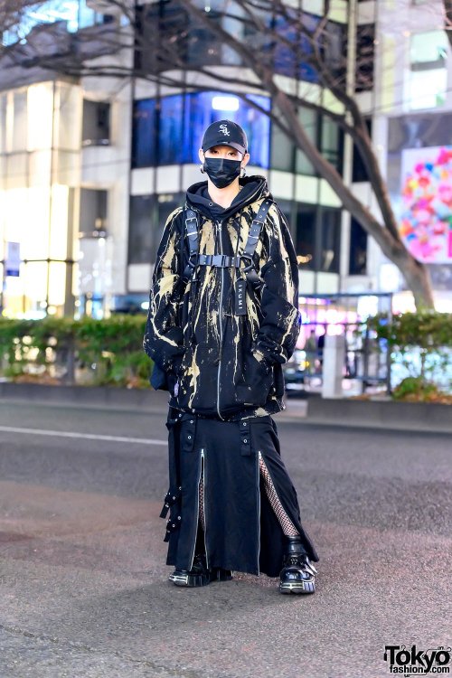 Japanese fashion staffer and freelance model Cham on the street in Harajuku. He&rsquo;s wearing laye