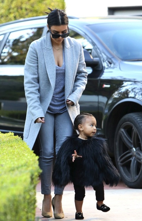 yeezusbound2:Kim and North arriving at a friends house in Beverly Hills.(11/28/14)