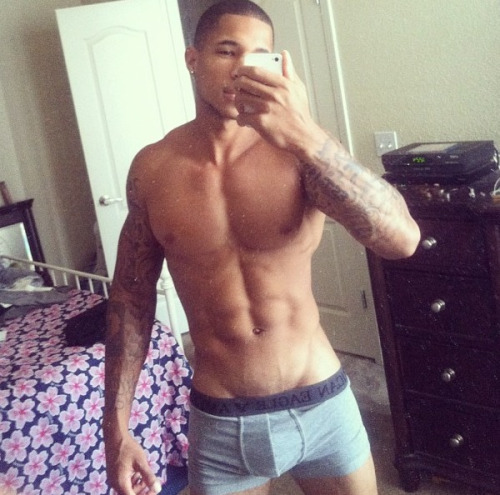 dominicanblackboy:  A sexy gorgeous moment wit hot tatted muscle yummy dick Derek Tramel!😍