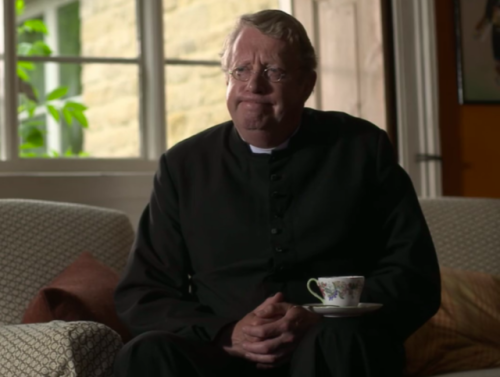 Detectives drinking tea: Father Brown is very concerned (but good at balancing a saucer.)