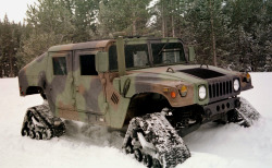 inthemilitary:  A test Humvee, equipped with four separate tracks for over the snow mobility, is used to support training at the Mountain Warfare Training Center, Bridgeport, Calif. Source: https://imgur.com/zlZ2SIL