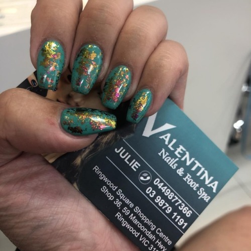 Teal Green with chrome leaf acrylic coffin shaped nails by Julie...