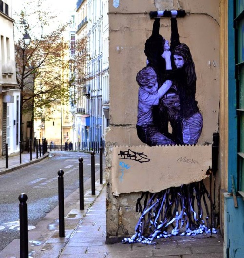 asylum-art-2:The infernal machine – The latest street art creations of french artist Levalet Here a
