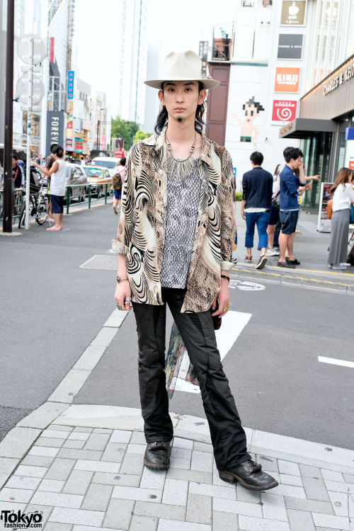 21-year-old Shota on the street in Harajuku. Shota works at the Shibuya vintage boutique Qosmos, and