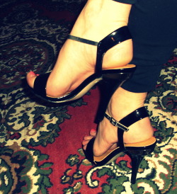 Upon sexy heels . .