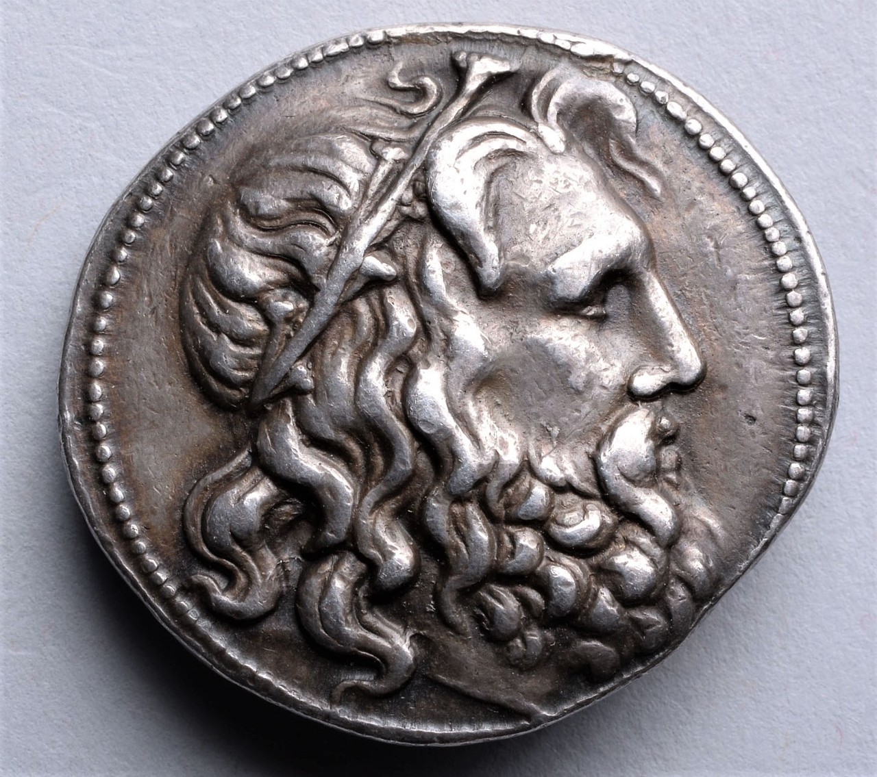 archaicwonder:  An Impressive Greek Silver Coin with a Fantastic Example of Hellenistic