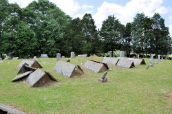 sixpenceee:  Tent Graveyards are usually located in the Highland Rim and western Cumberland Plateau area of Tennessee. Reasons for their construction are often given as protection from animals such as cattle walking on the graves or to protect the grave