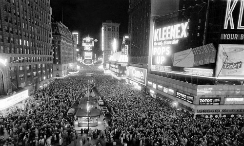 Two views of New Year&rsquo;s Eve, Times Square, New York City, 1956 / photos for Life by W