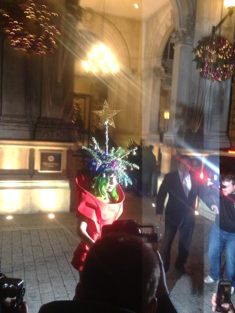 gagaroyale:  Gaga has just arrived back to her hotel wearing a christmas tree as