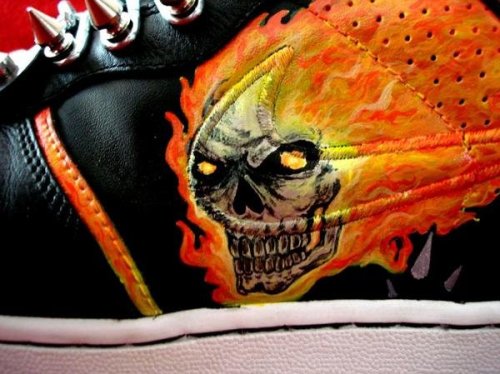 wearmyart: Hand painted ‘Ghost Rider’ custom Nikes with custom spikes, emblem and chain ‘laces.’ The