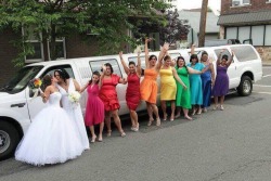 gehayi:  egyptiannefertiti:  LOVE WON.  I love the rainbow bouquet one of the brides is holding. 