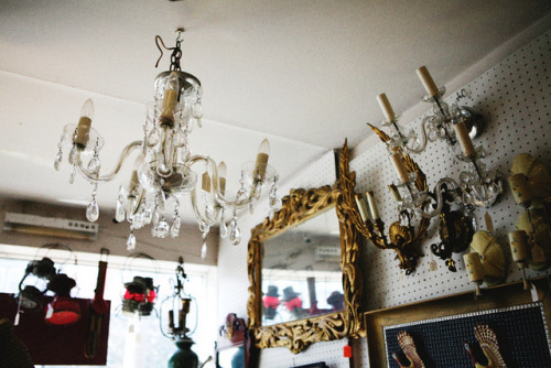 flamebegins:dim antique shop by wanderingstoryteller on Flickr.