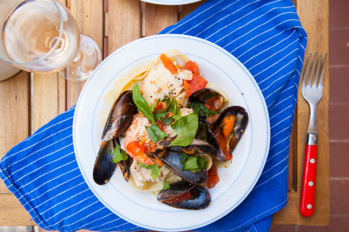 french riveria balcony lunch at home: mussels, shrimp, sea bass, white wine tagliatelle with some cô