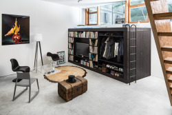 thisisinterest:  The living cube I moved into a apartment studio without storage room. So i made a minimalistic cube design witha shelf for my vinyl collection, my TV, Clothes and Shoes. On the cube is a guest bed and inside the cube is a lot of storage