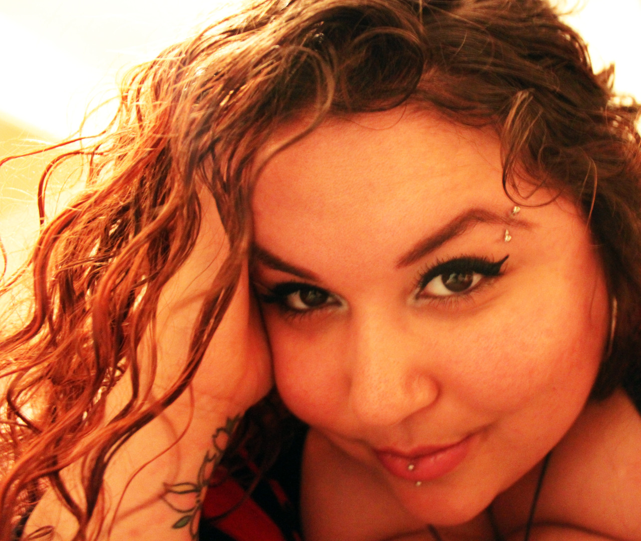 thelaughingempress:  You can almost see all of my wrist tatt. 