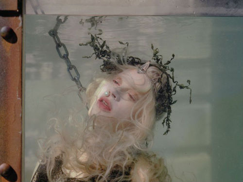 bebemoon:kristen mcmenamy (in dior) as a captured mermaid in w magazine’s ‘far from land’ editorial.