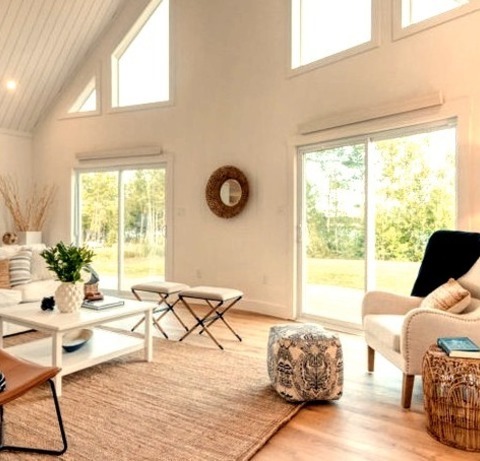 Loft-Style - Beach Style Living RoomLiving Room: Shiplap Ceiling, A Mid-sized Coastal Loft-style Laminate