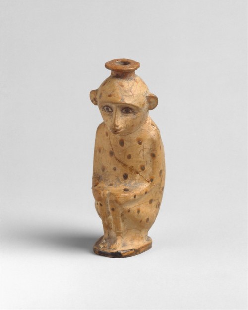 Ancient Greek terracotta aryballos (perfume vase) in the form of a monkey.  Artist unknown; ca. 600-
