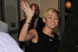 dogforce:  officialmileyrares:  Miley Cyrus Treats Couple at Restaurant  Miley Cyrus paid for a couple’s meal after she disturbed them in a restaurant. The ‘Wrecking Ball’ singer was reportedly noisy and caused a scene when she and a friend went