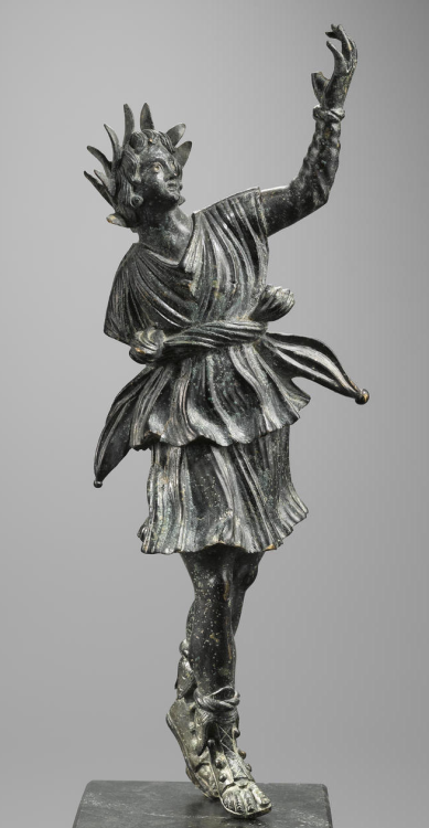 archaicwonder: A Roman bronze figure of dancing Lar, Circa 1st Century BC/AD The sizeable figure is 