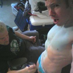 gaycomicgeek:  Very old picture. I was being painted to look like Iceman. He is not touching my crotch.