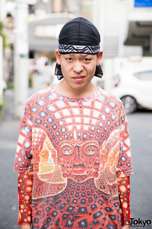 Penipeni from Dog Harajuku wearing a graphic top (from Dog), shorts over leggings, and Nike sneakers