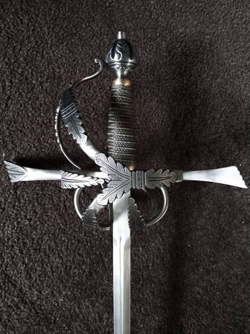 longswordsinlondon:  From http://www.danelliarmouries.com/“For this fully hand carved and engraved beauty I’ve been asked to adapt what was an original italian sidesword design into a rapier. Had to change some of the proportions of the hilt and pommel