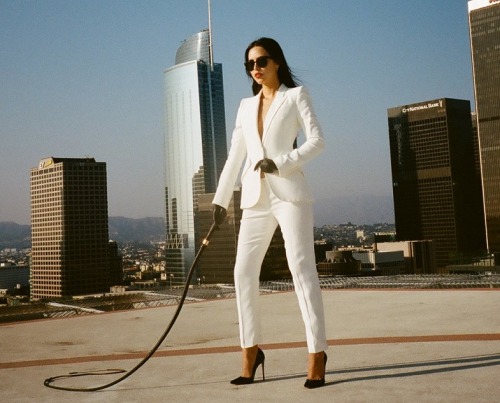 Our new boss just arrived on the helipad. I heard she really cracks the whip.