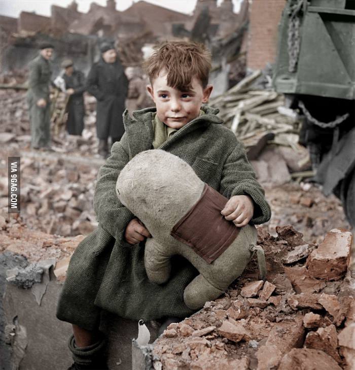 ragecomics4you:  Abandoned Boy Holding a Stuffed Toy Animal. London 1945http://ragecomics4you.tumblr.com