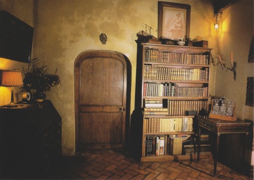 vintagehomecollection: A vestibule between living room and bedrooms. On the left is a fall-front des