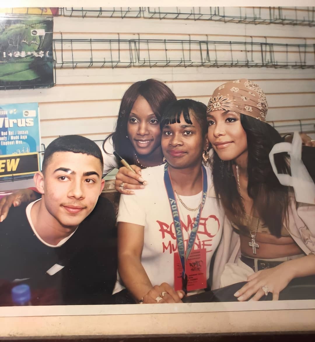 Aaliyah Unleashed — Aaliyah with fans at HMV music store March 28th