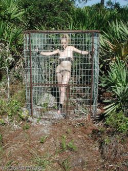 bondage-ponygirls-and-more:  Alexis, caged outdoors in Florida.