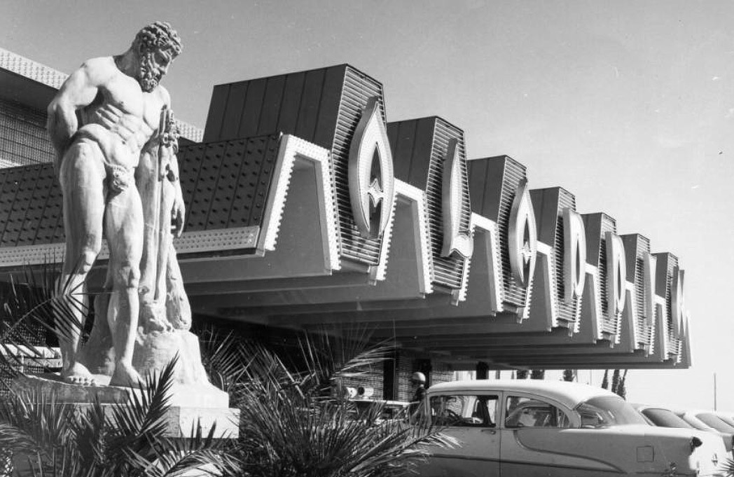 Aladdin, Las Vegas, 1966.
“Aladdin Casino was the first Las Vegas establishment to integrate major sign elements and neon into its porte-cochère. Sign modules were incised into the leading edge of the projecting canopy and wrap-around grids of...