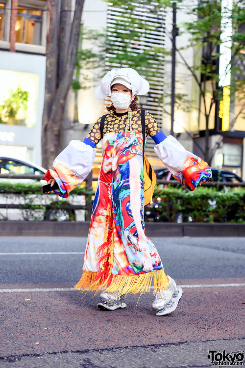 Japanese fashion designer/student Sakuran on the street in Harajuku wearing colorful handmade fashio